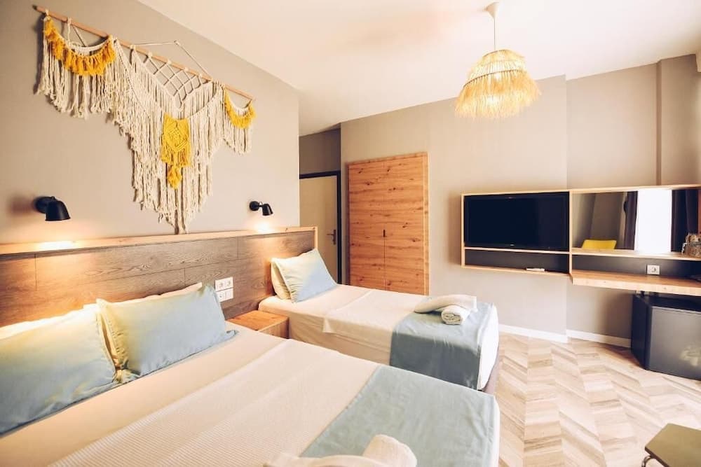 Superior Triple Room, Partial Sea View